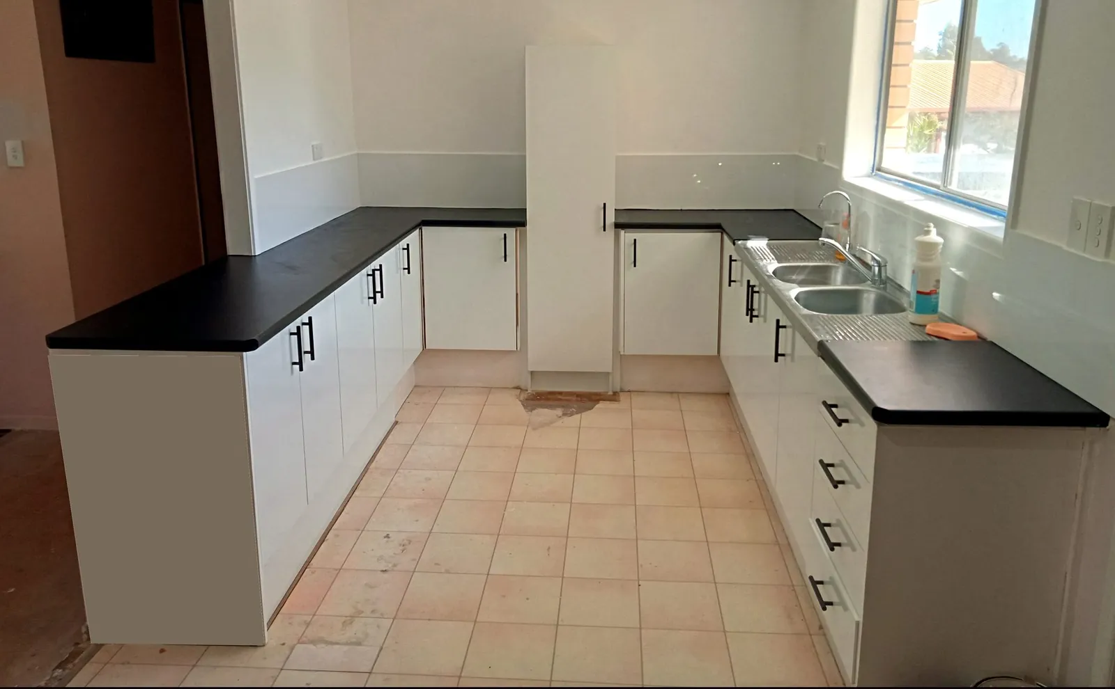 Renovated modern kitchen with custom cabinetry on the Gold Coast