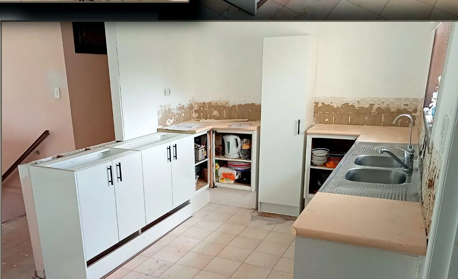Kitchen cabinetry being installed during renovation - Gold Coast